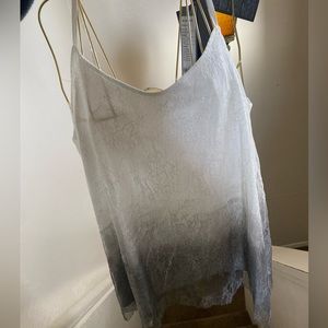 Brand new tank top in lacy white and grey wit sequins